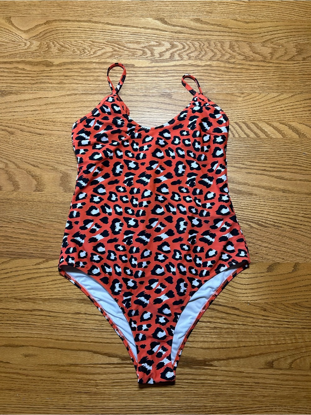 Women’s Cupshe One Piece Red/Orange with White and Black Leopard Size Medium?